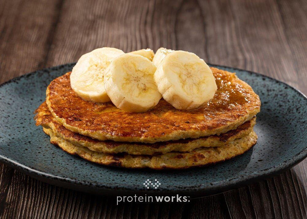 Apple Fiber Protein Pancakes with Banana Macadamia Syrup