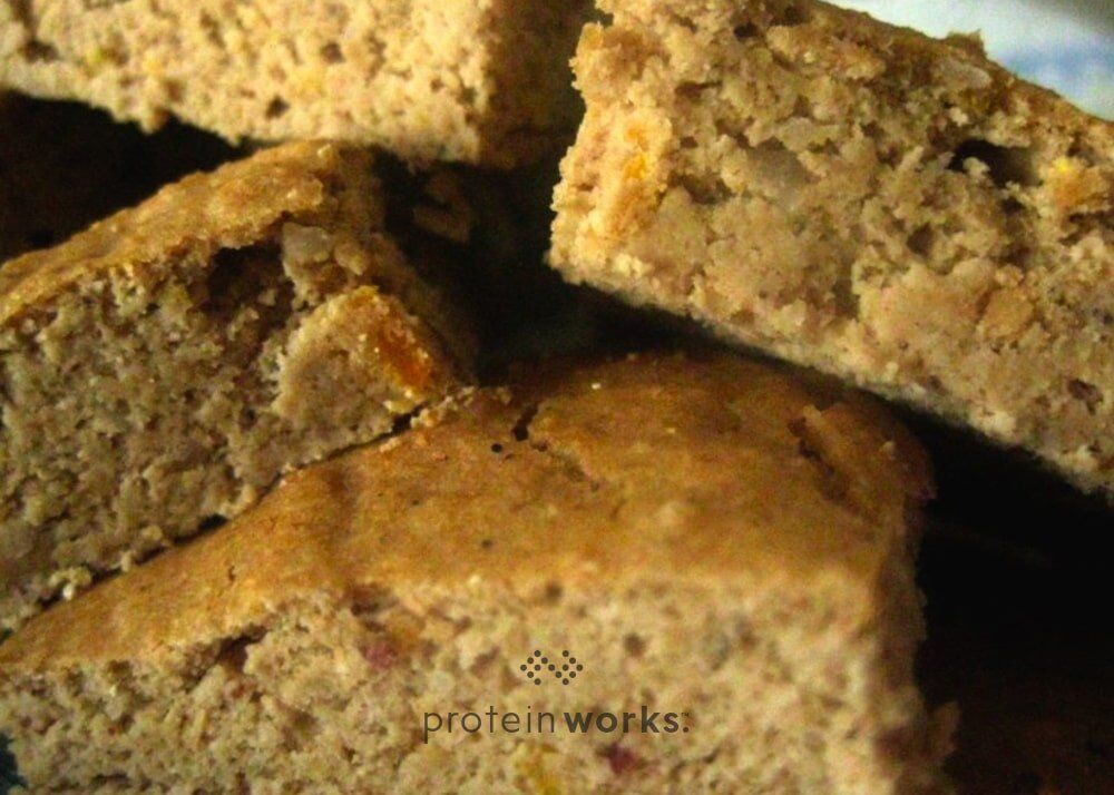 Protein Packed Banana Coconut Orange Blondies with Macadamia & Pecans